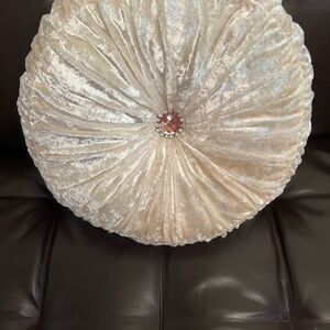 Elegant Cream Velvety Round Pillow with Gem Accent
